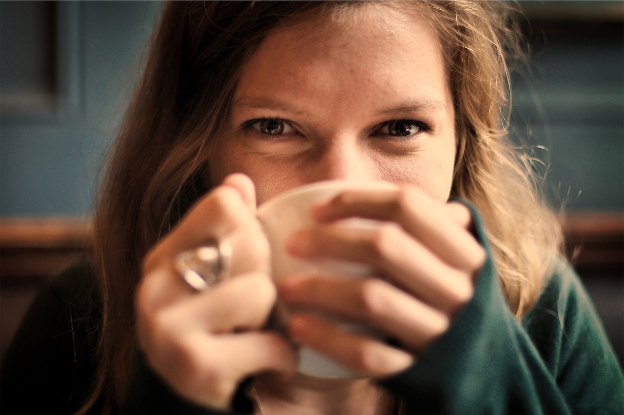 girl enjoying a hot cuppa