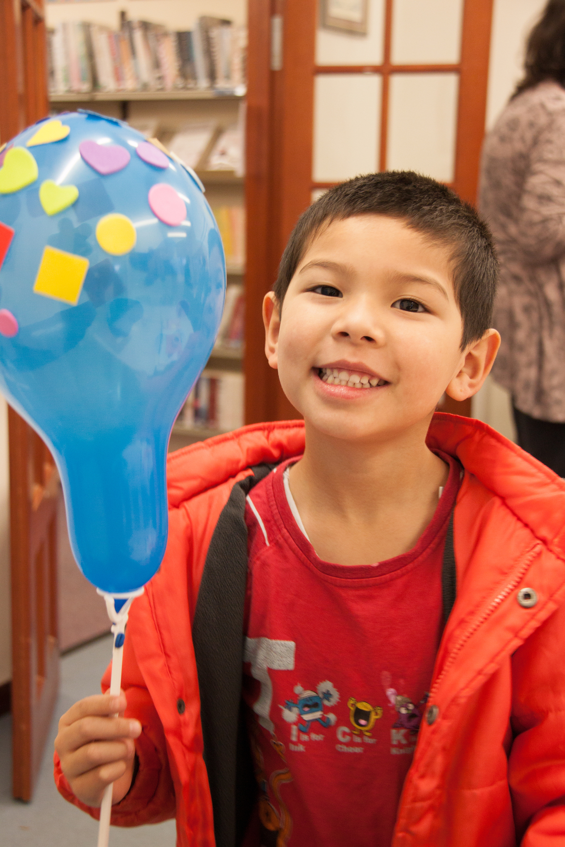 Alex Eaves holding a decorated balloon Feb 2016