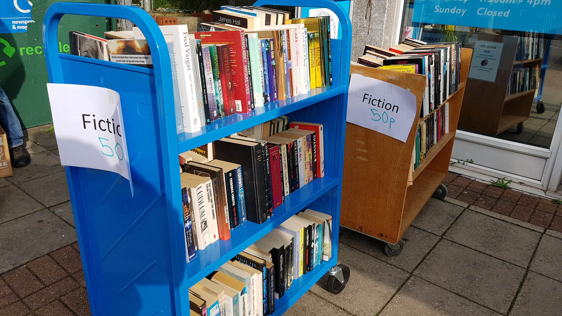 Books on Sale Outside Library