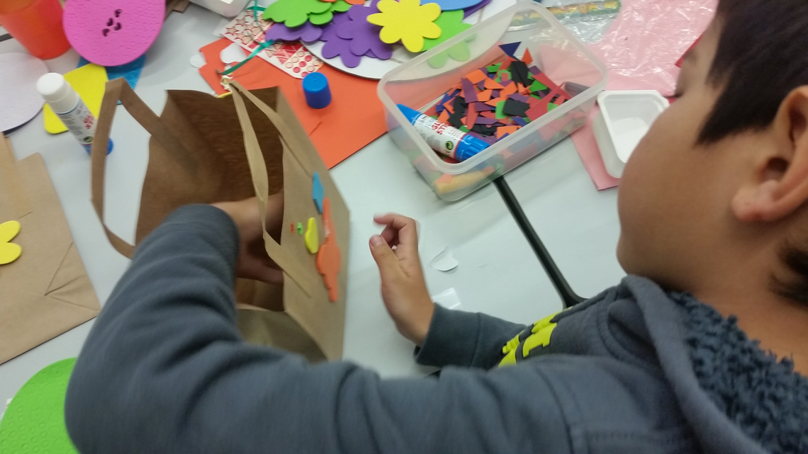 Boy making craft bag Oct 2016