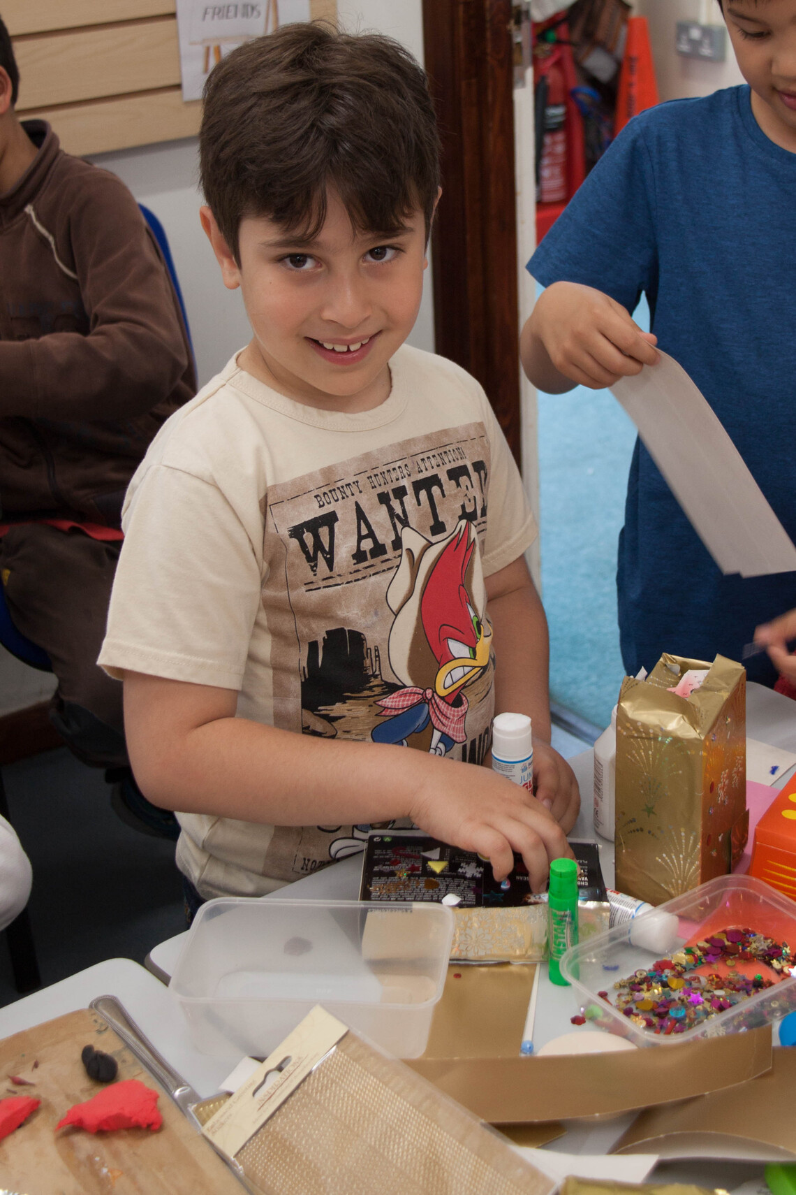 Boy Participating in Craft Event