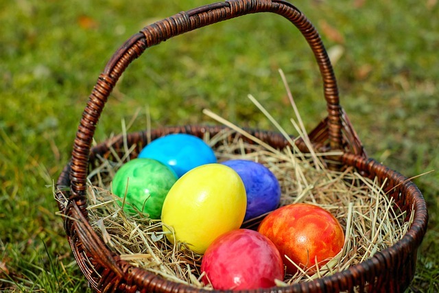Coloured eggs in a basket