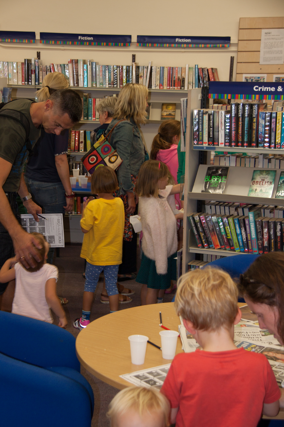 Library with lots of people celebrating 2016