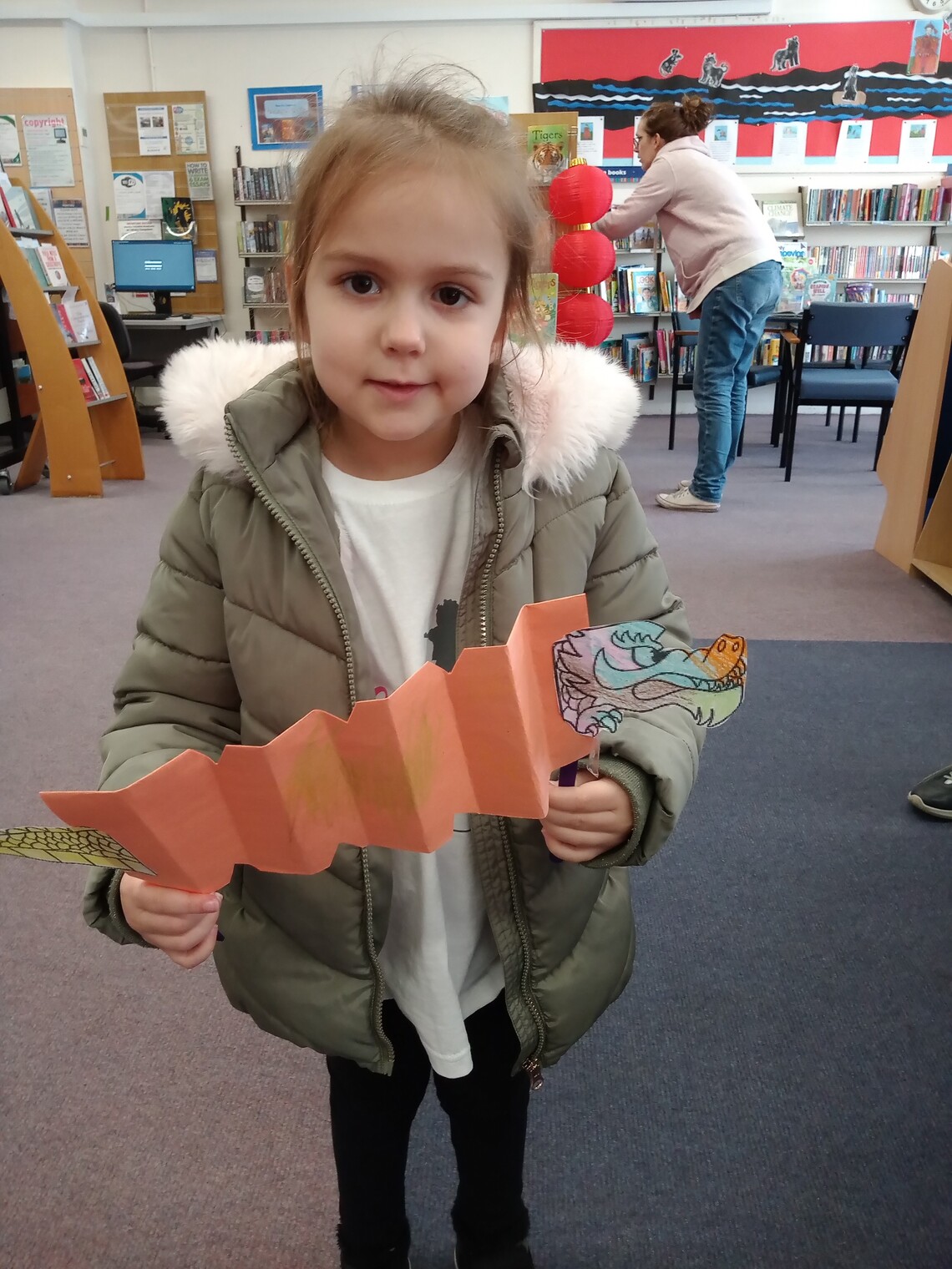 Young Girl holding Chinese Craft 2022