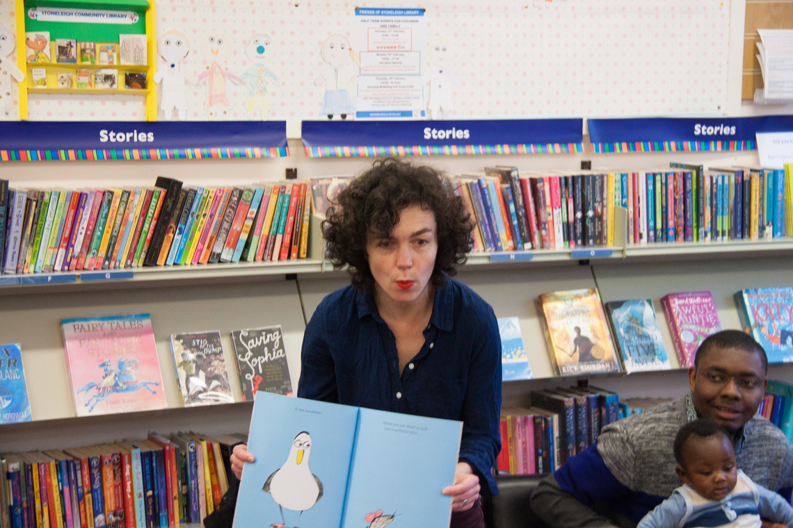 Zehra Hicks presenting and open book at Rhymetime Feb 2016