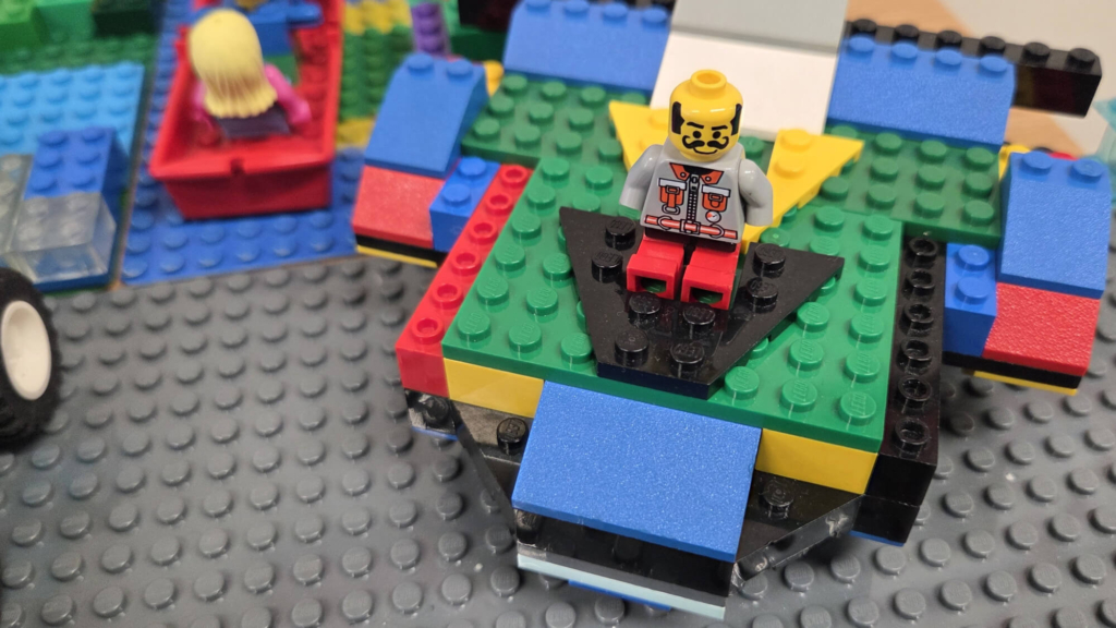 Lego Man Sitting On Cart Close Up Lego Man Sitting On Cart Close Up